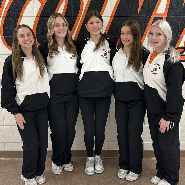 students wearing orange