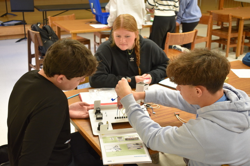 Students working on STEM solar suitcase project