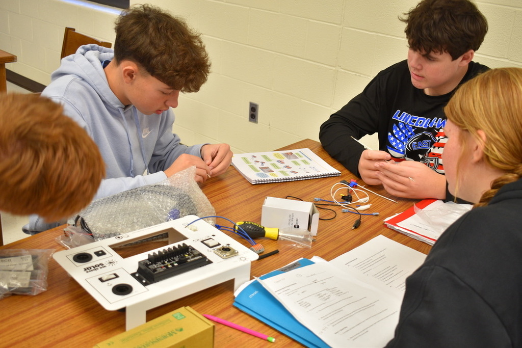 Students working on STEM solar suitcase project