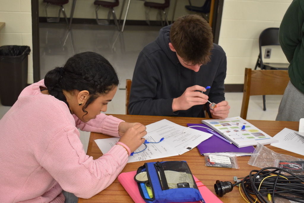 Students working on STEM solar suitcase project