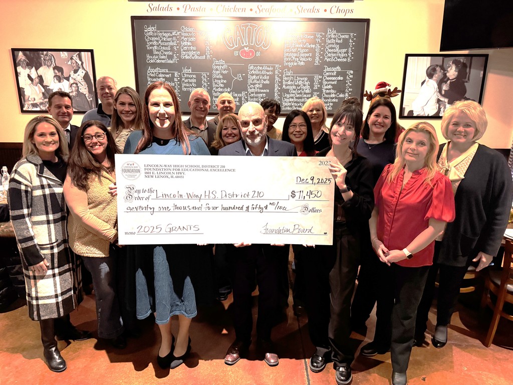 Lincoln-Way foundation board members and LW administrators posing with check donation