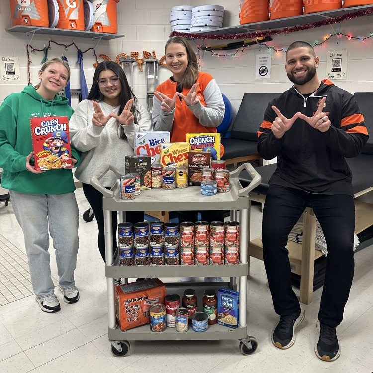 student’s and trainers with food donations