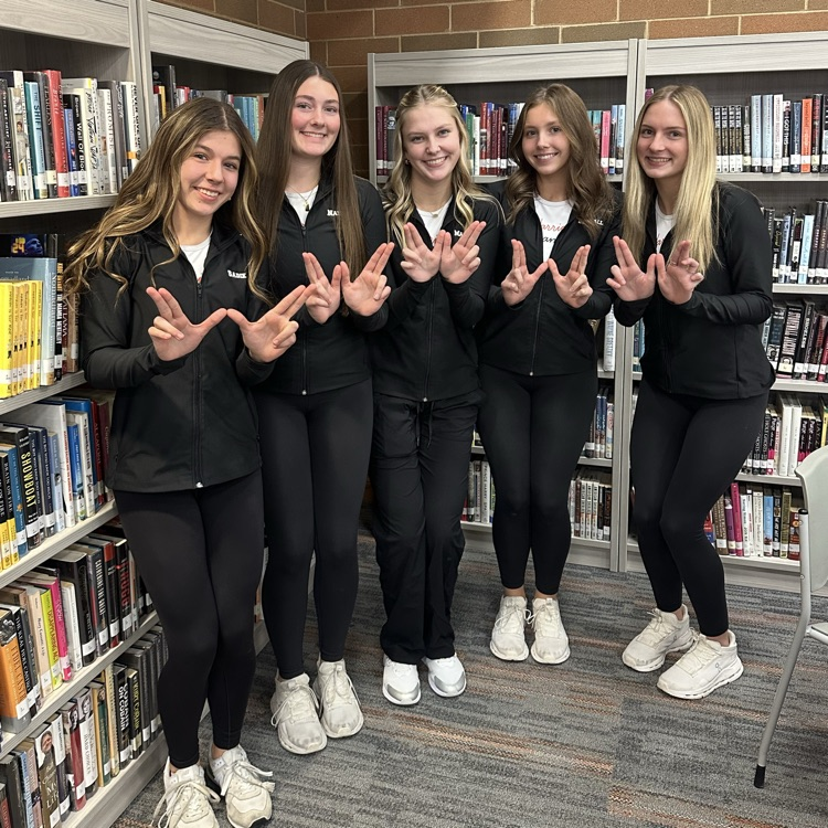 students wearing orange