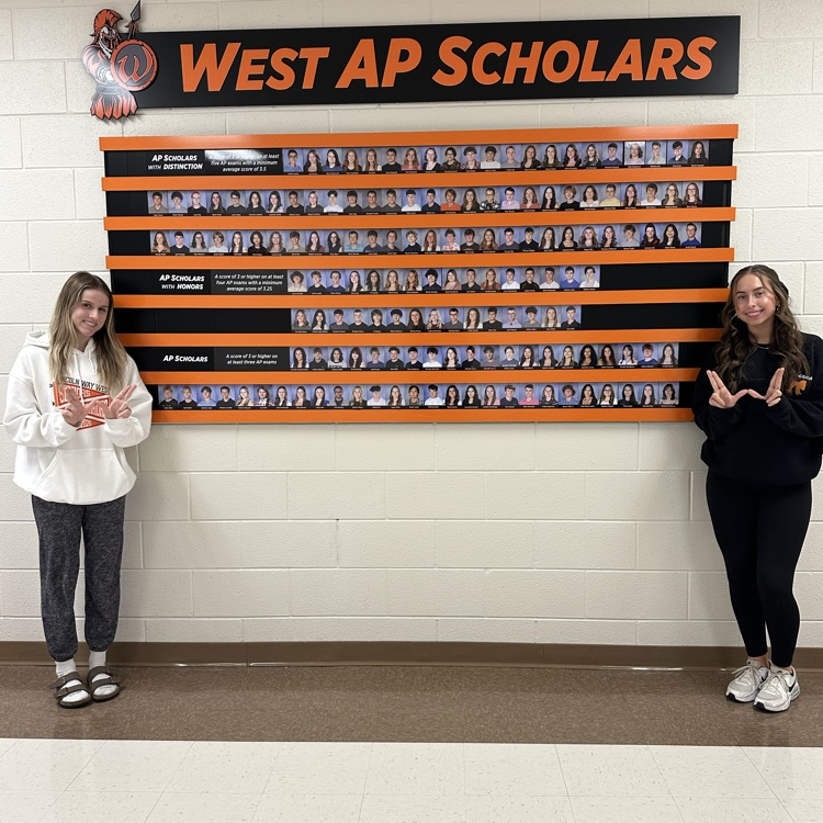 students near the AP scholar board