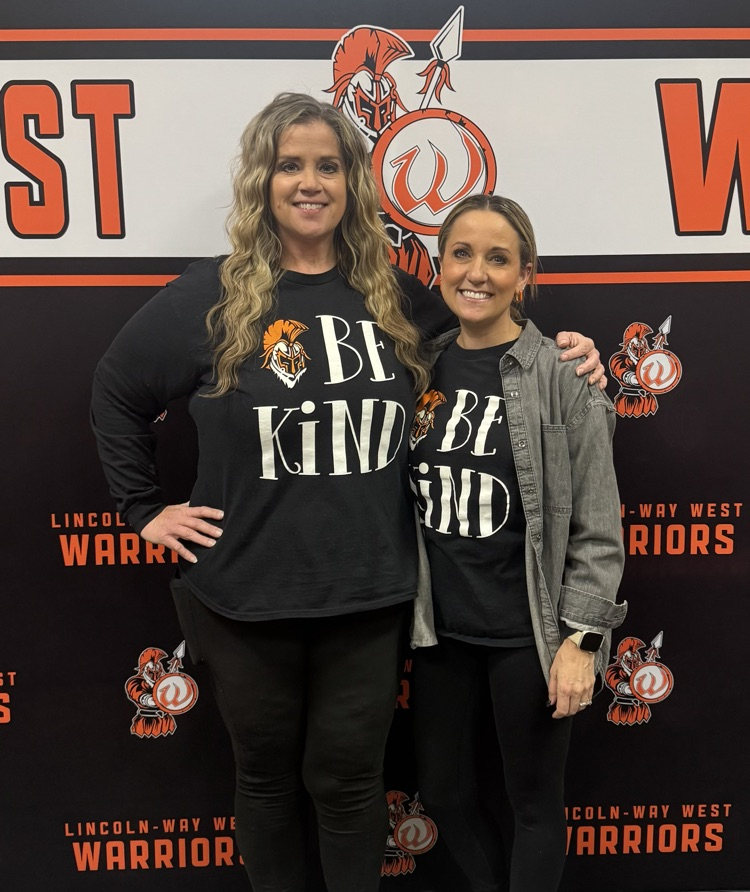 staff in be kind shirts 
