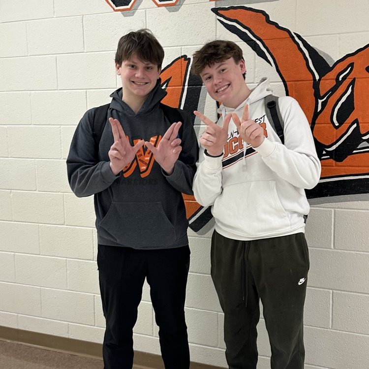 students wearing orange