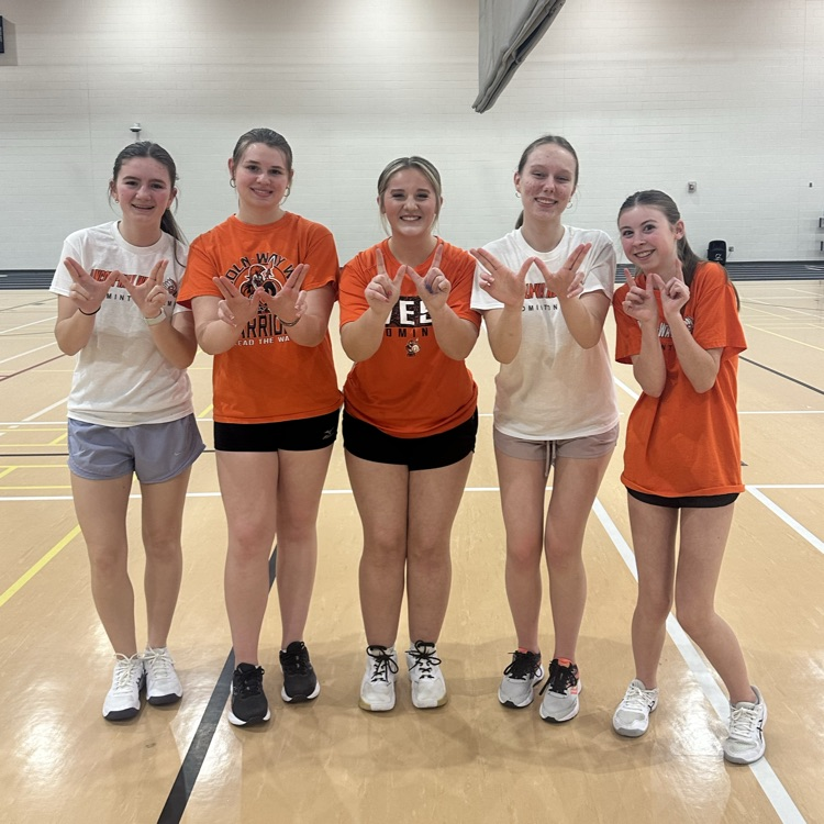 students wearing orange