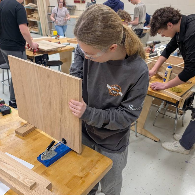 students working in wood shop