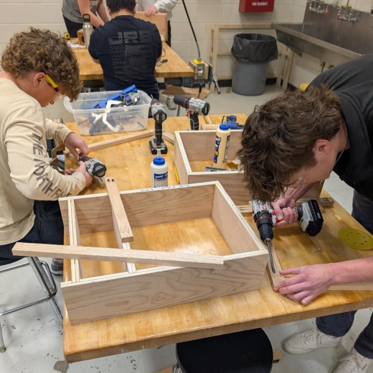 students working in wood shop