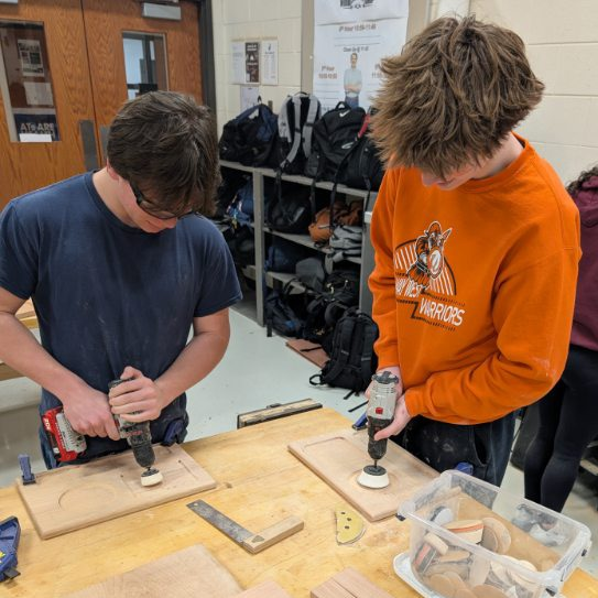 students working in wood shop