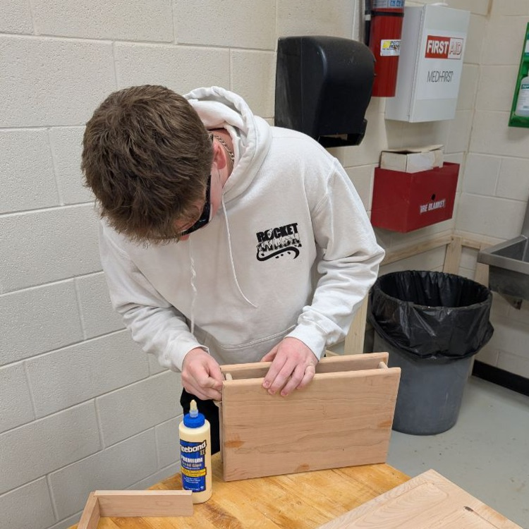 students working in wood shop