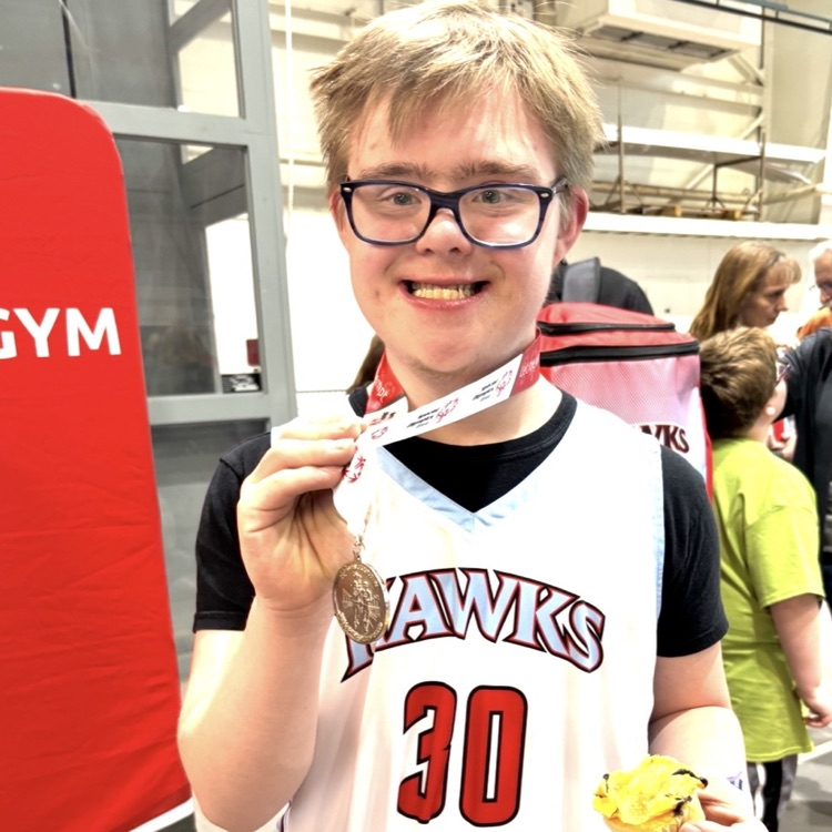 student with silver medal