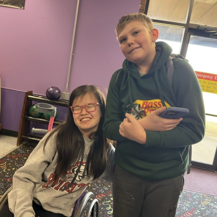 students waiting to bowl