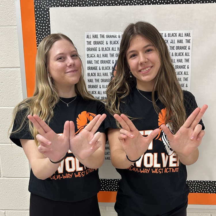 students wearing orange 