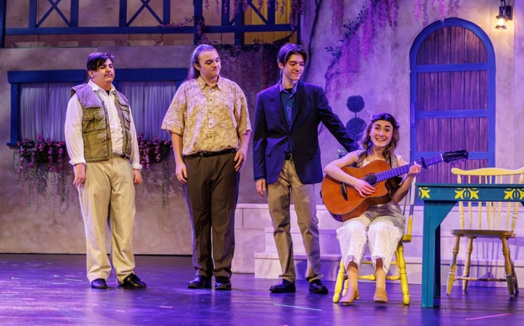 students acting on stage