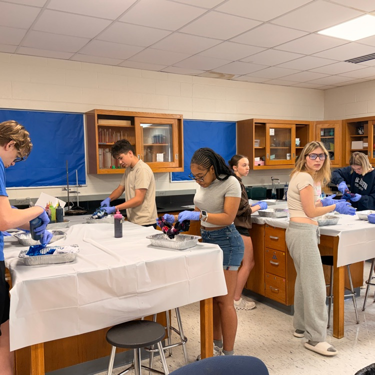 science students making tie-dye shirts 