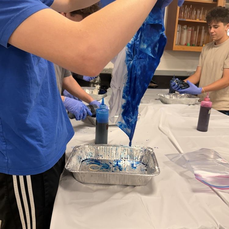 science students making tie-dye shirts 