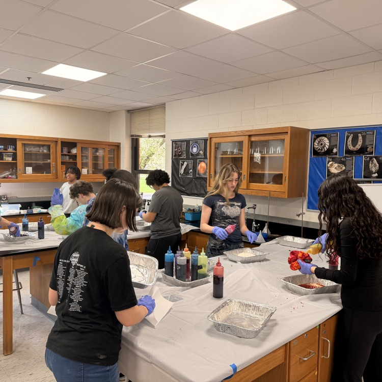 science students making tie-dye shirts 