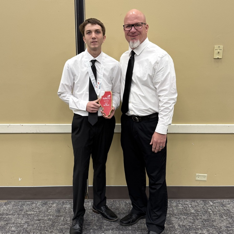 student and sponsor posing together for a photo