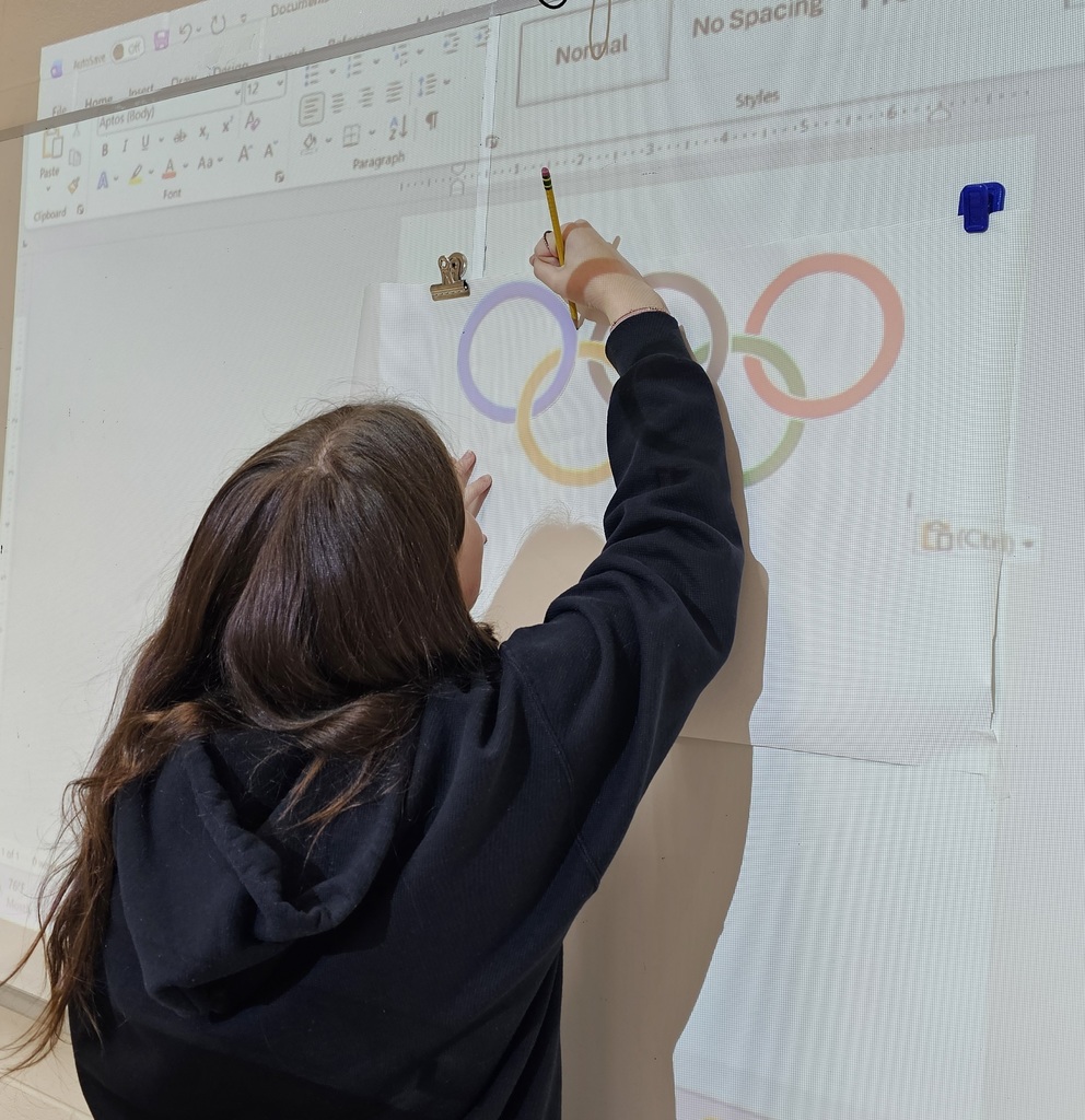 interact Club making signs for the special games parade