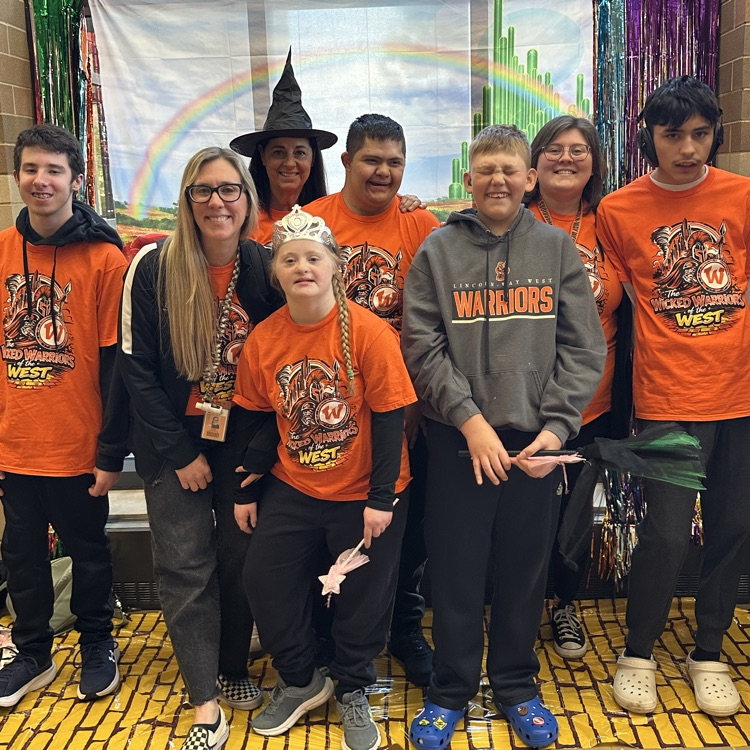 posed class photo with staff and students 