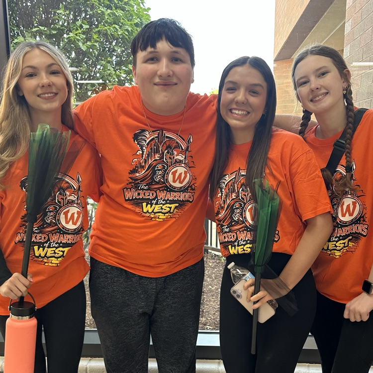 four students posing for a photo