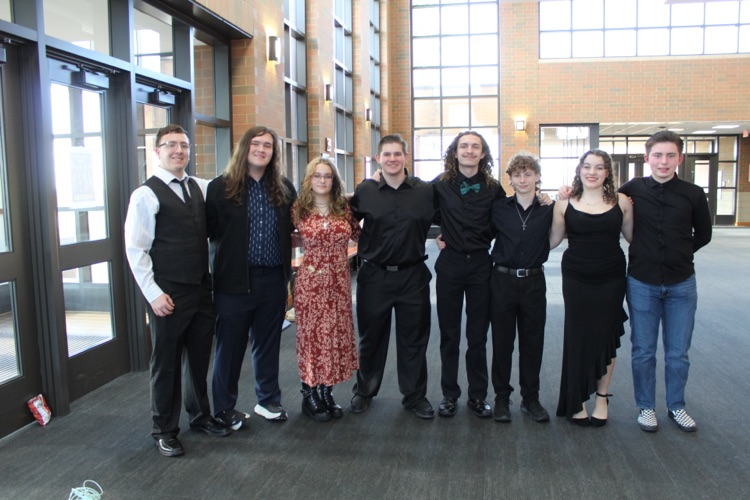 multiple students posing for a photo at the event