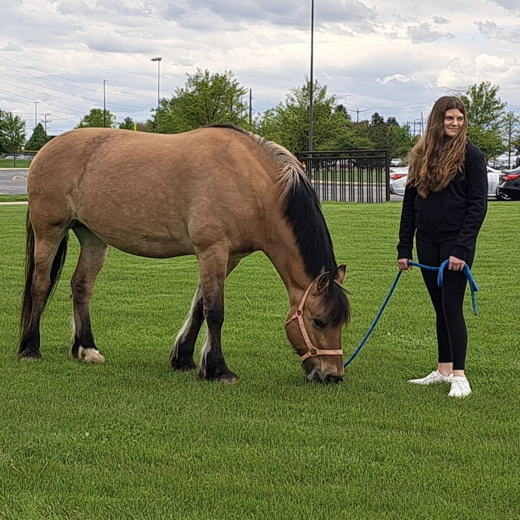 student with horse 