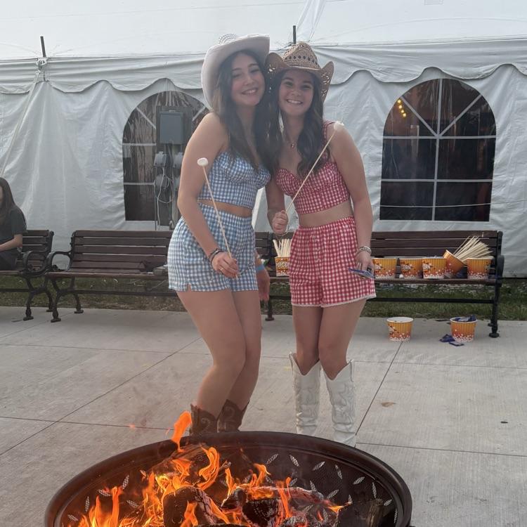 two students making smores