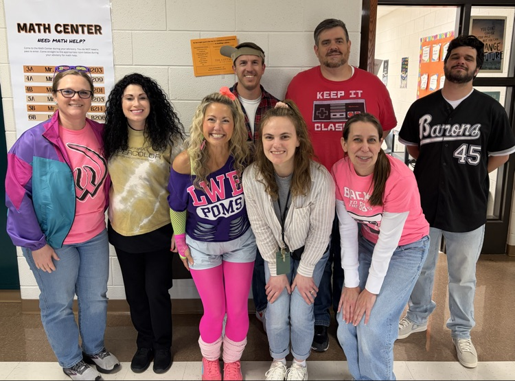 math department posing for a photo in 80s gear 