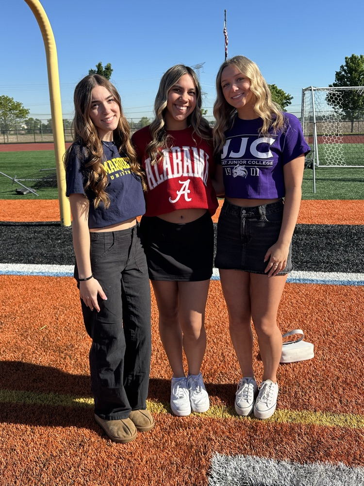 three students posing for a photo