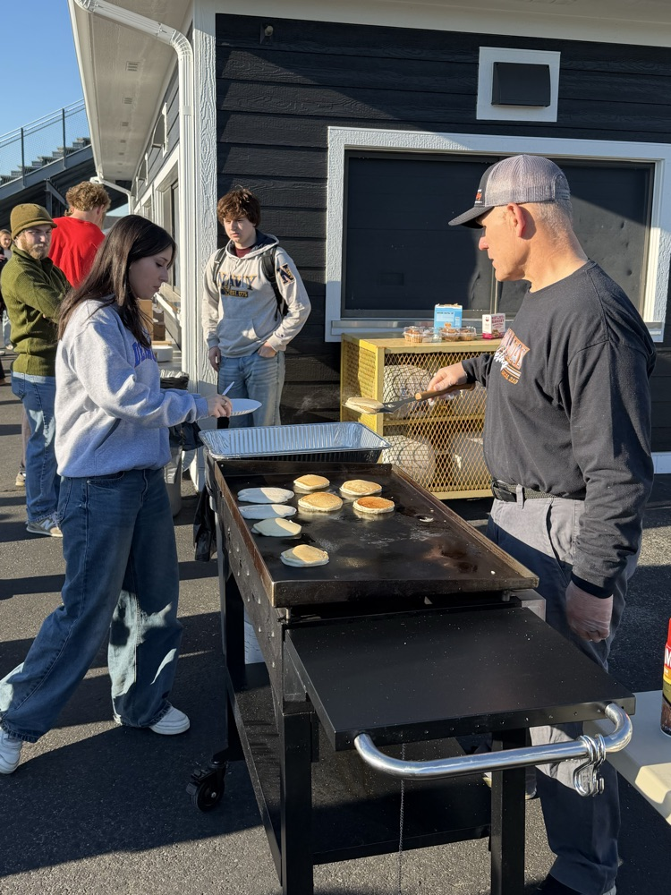 student getting pancakes