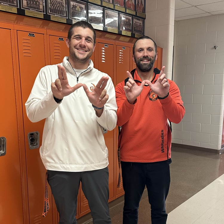 staff members wearing orange 