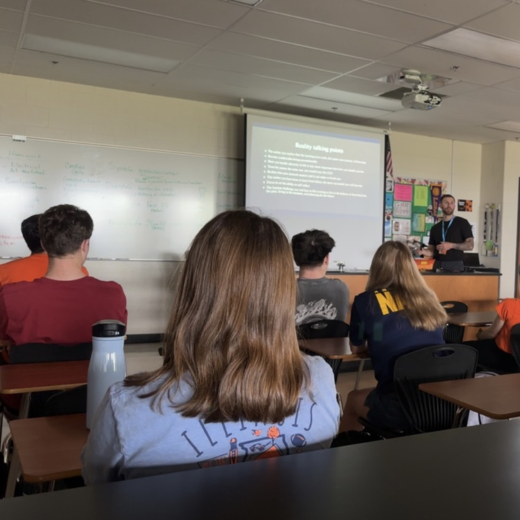 guest presenter in classroom presenting