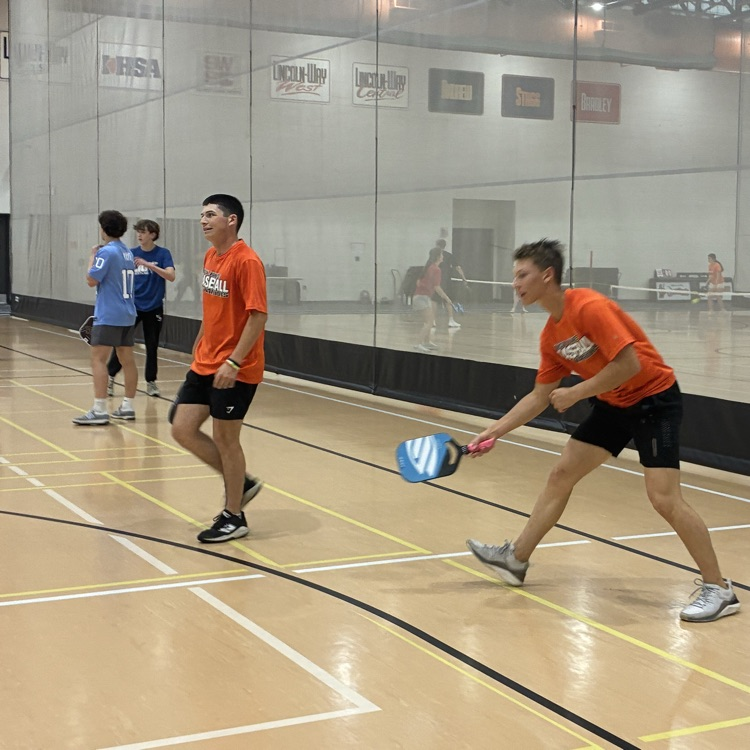 action photo of pickleball match