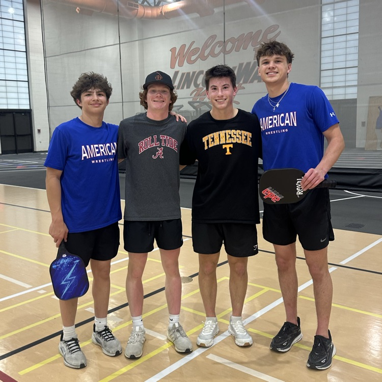 group of students posing for a photo at pickleball 