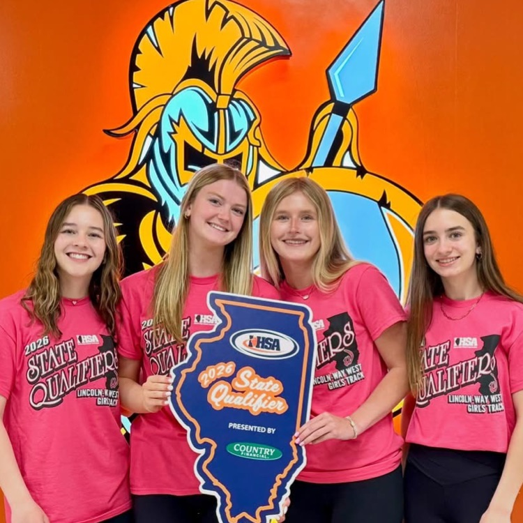 four students holding a state of Illinois graphic in front of the school logo