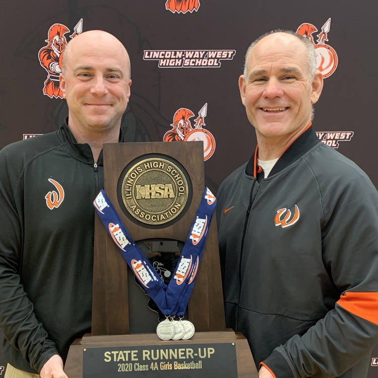 staff with state trophy