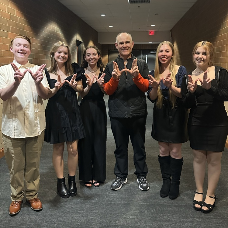 students and principal posing for a photo