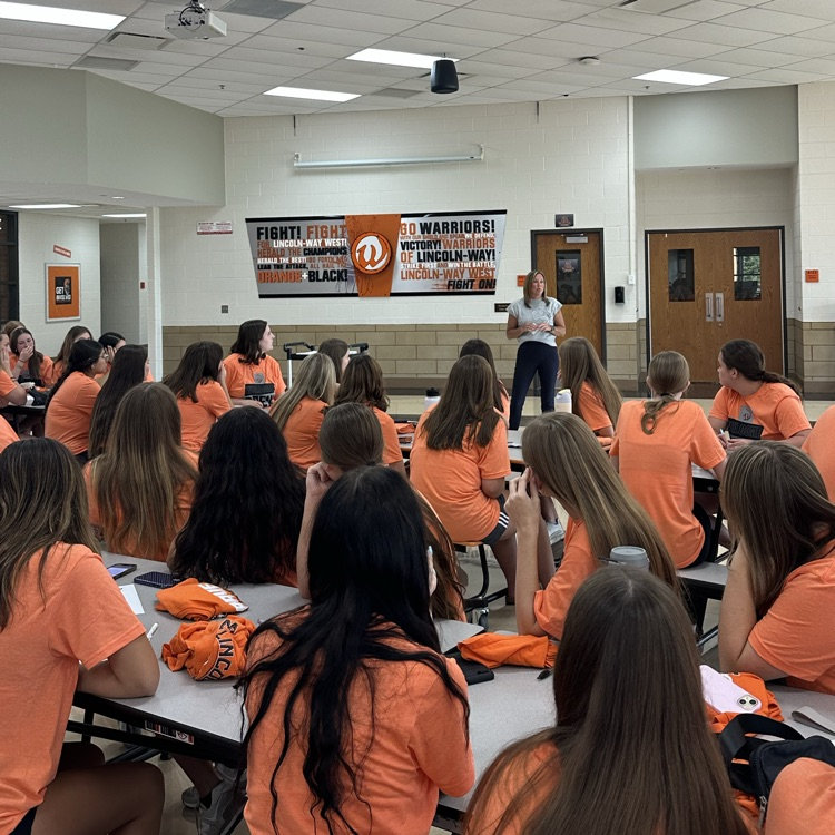 principal presenting to students