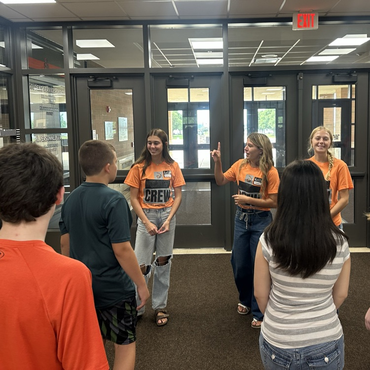 leaders giving information on building tour