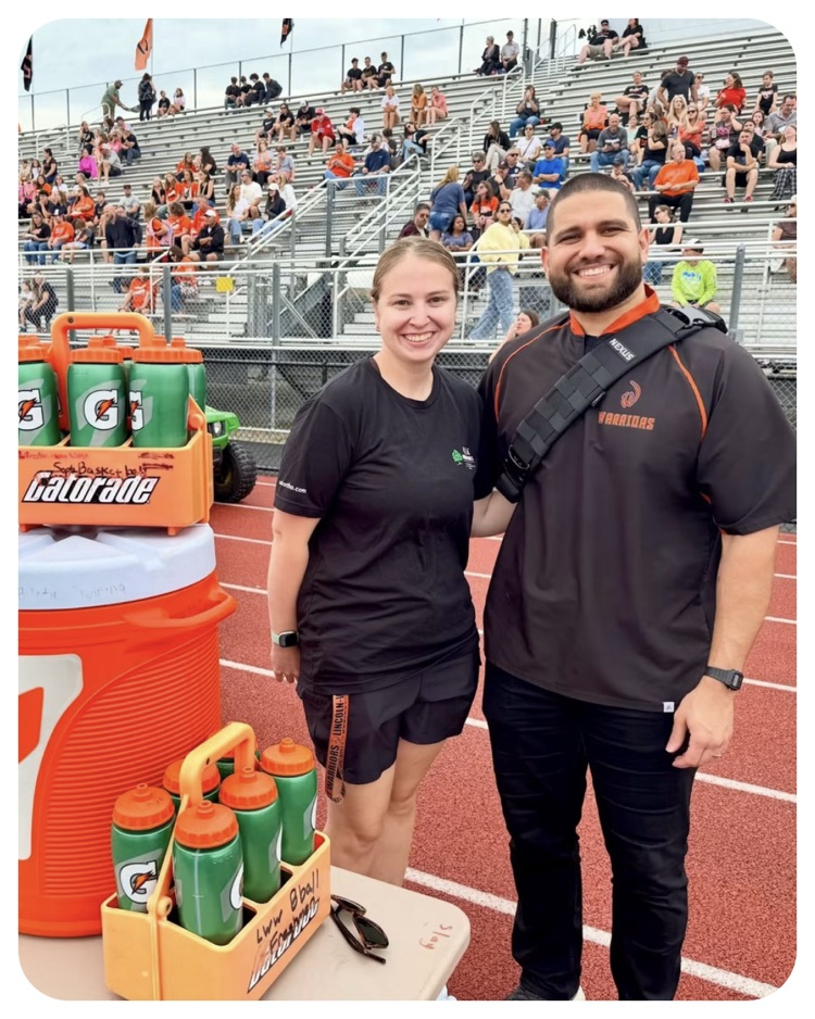 two athletic trainers at the stadium