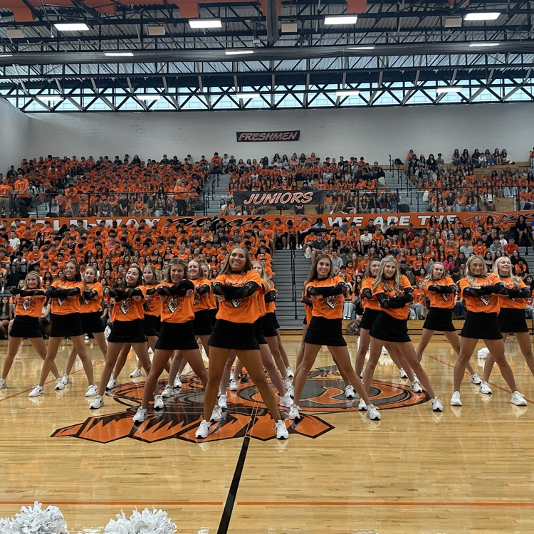 dance team at the end of their performance during the assembly