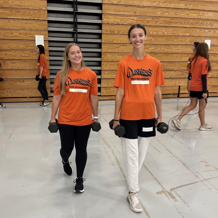 two students participating in class