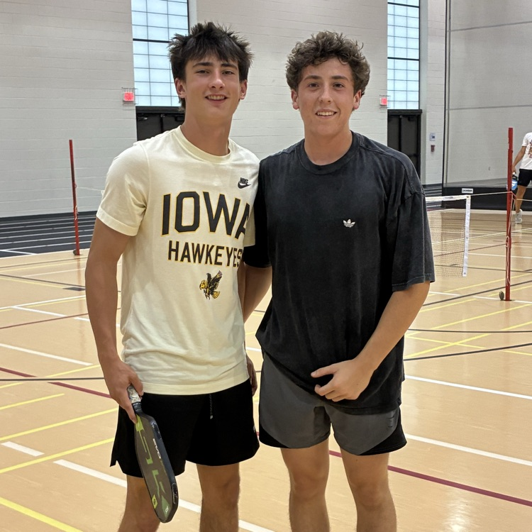 students in the fieldhouse after competing at pickleball