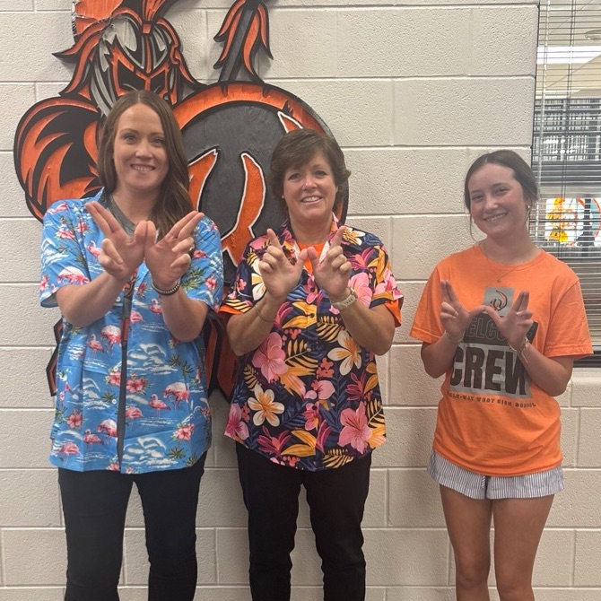 staff in tropical shirts