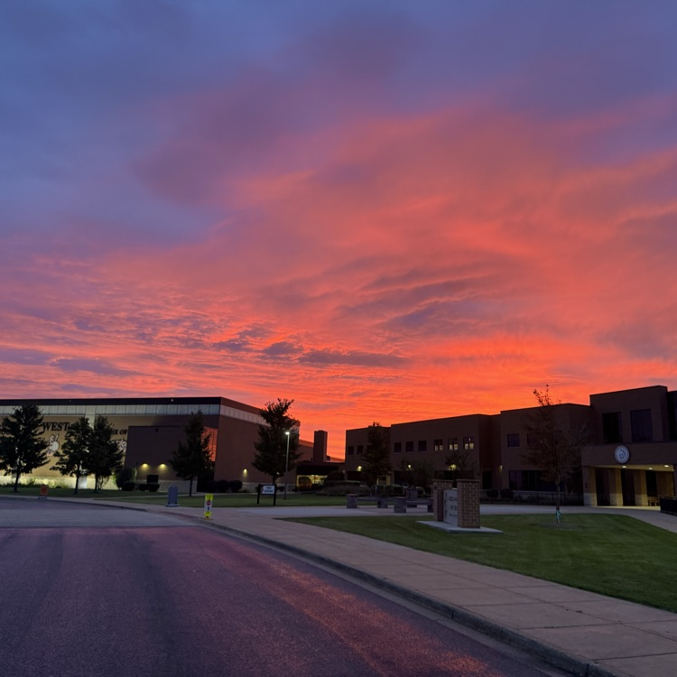 sunrise with school building
