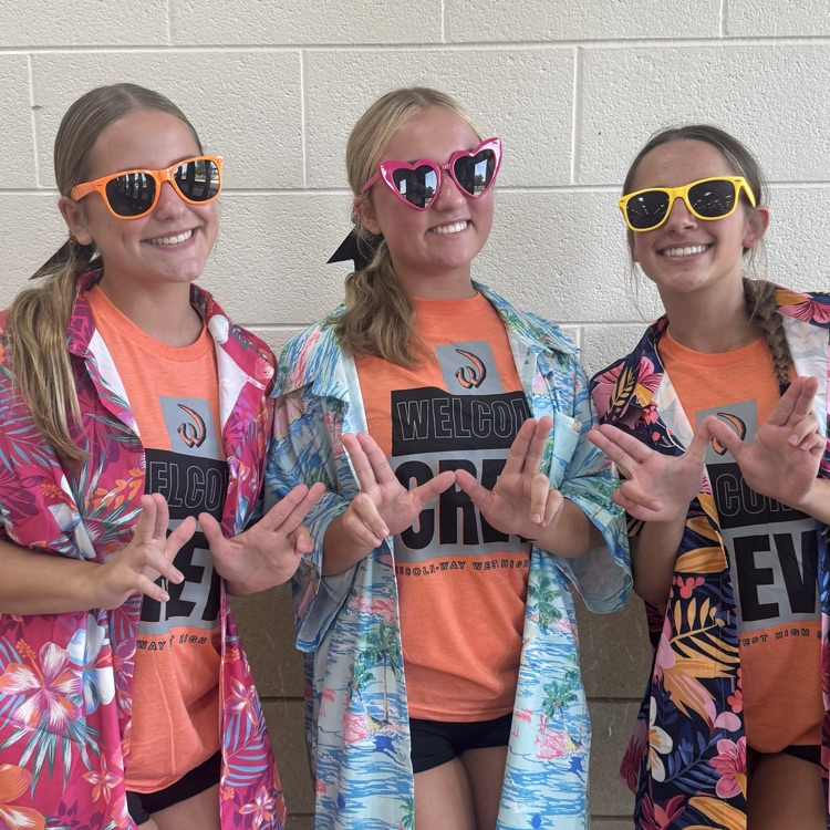 students wearing tropical shirts with bright colors