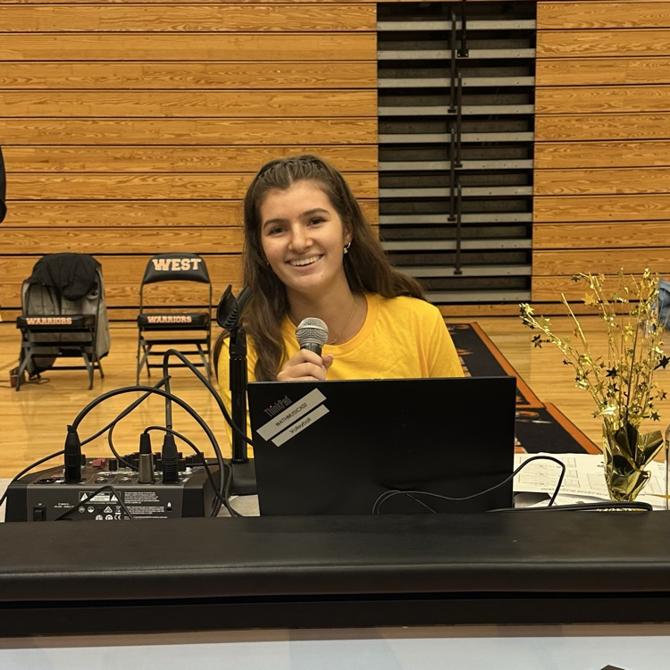 students announcing at scorers table