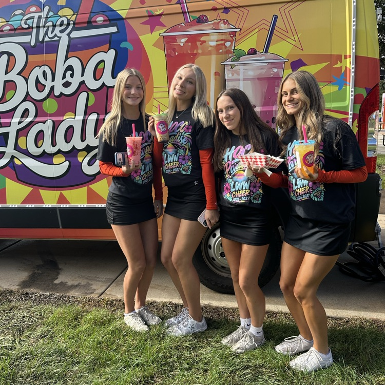 students in front of food truck